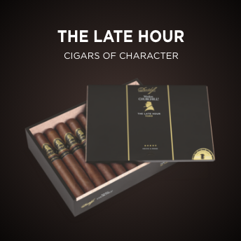 Advertisement for Davidoff: The late hour. Cigars of character. 
