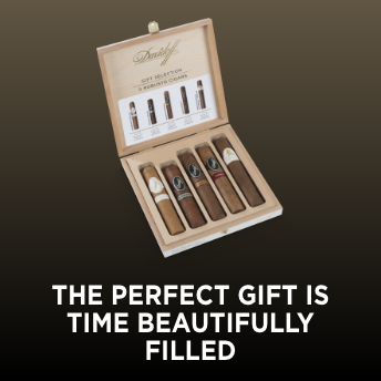 Advertisement for Davidoff: THE PERFECT GIFT IS TIME BEAUTIFULLY FILLED.